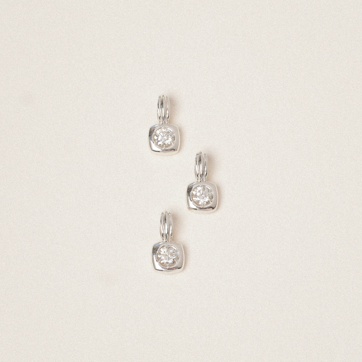 Mini Flourish Diamond Pendant in Sterling Silver